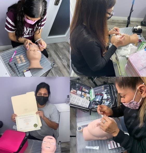 Students practicing lash extension techniques on mannequin heads during a lesson at Anahit's studio