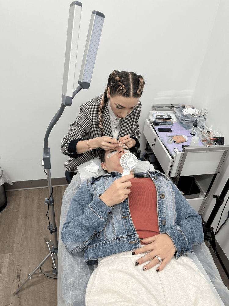 Anahit Poghosyan applying lash extensions to a client at her Montebello studio